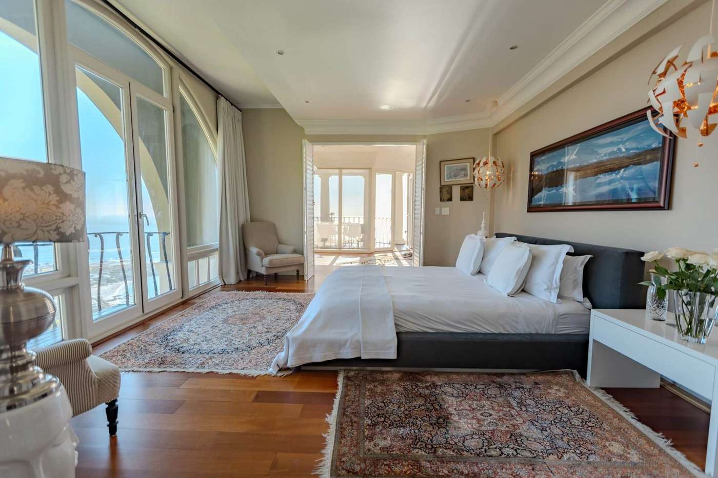 The bedroom of the Penthouse, opening onto its own terrace