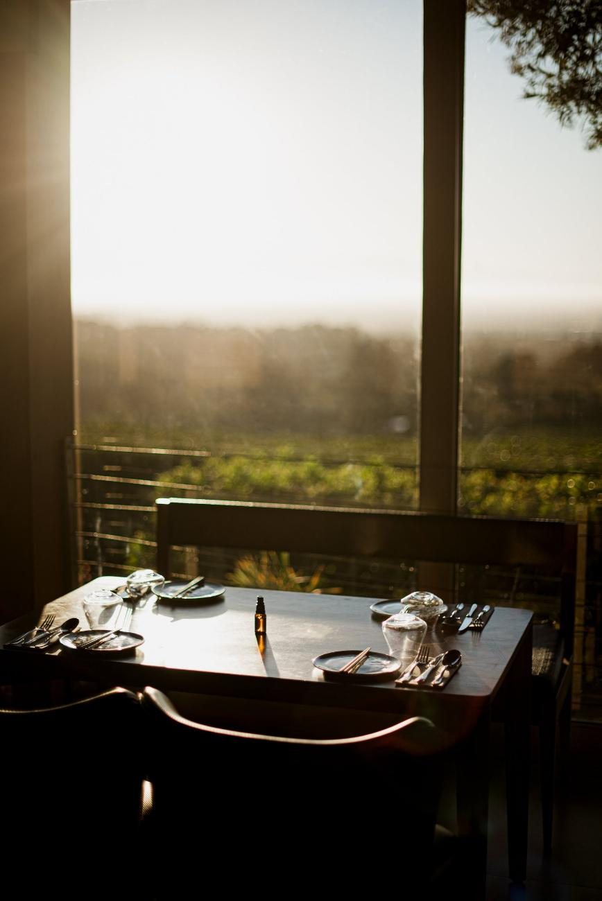 A table by a window at sunset
