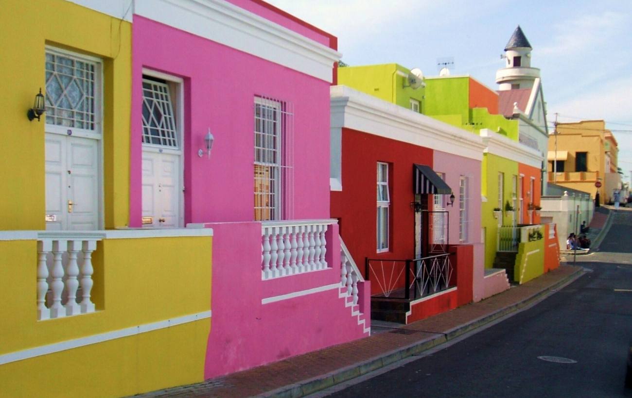 A row of brightly painted houses on Chiappini Street