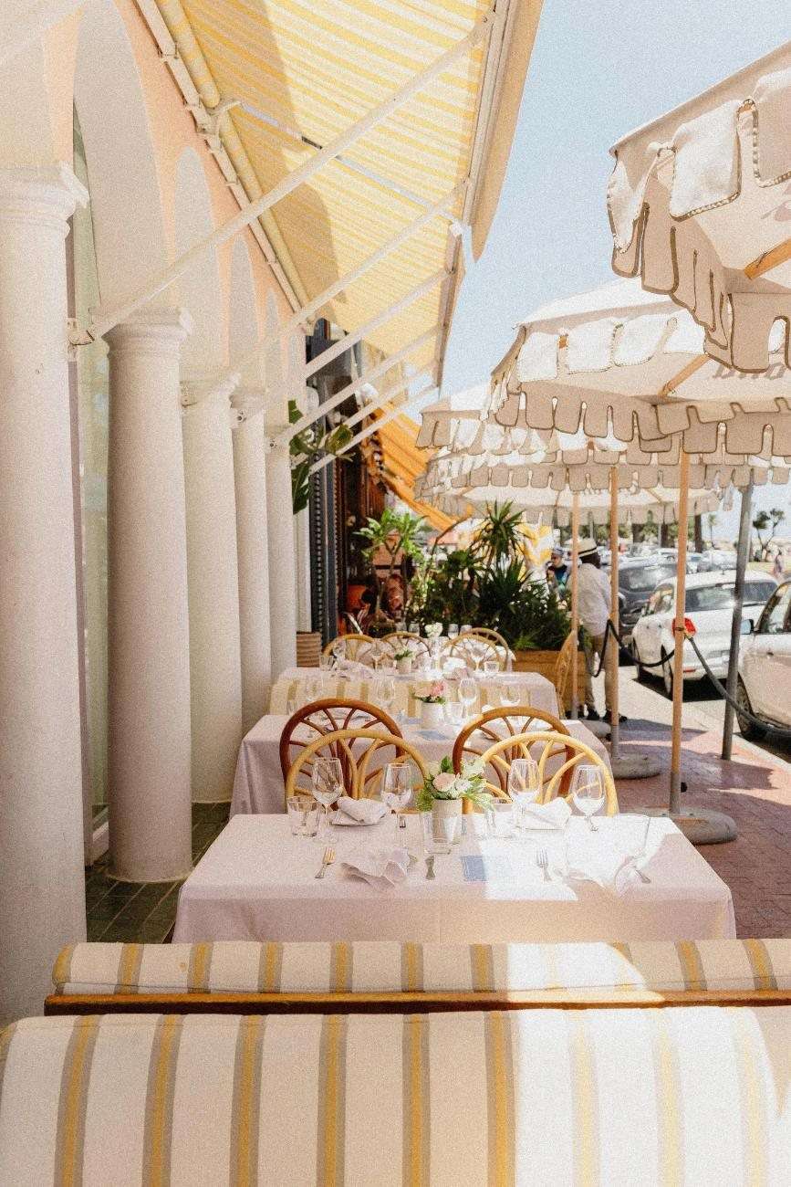 Tables laid for lunch at Café Caprice