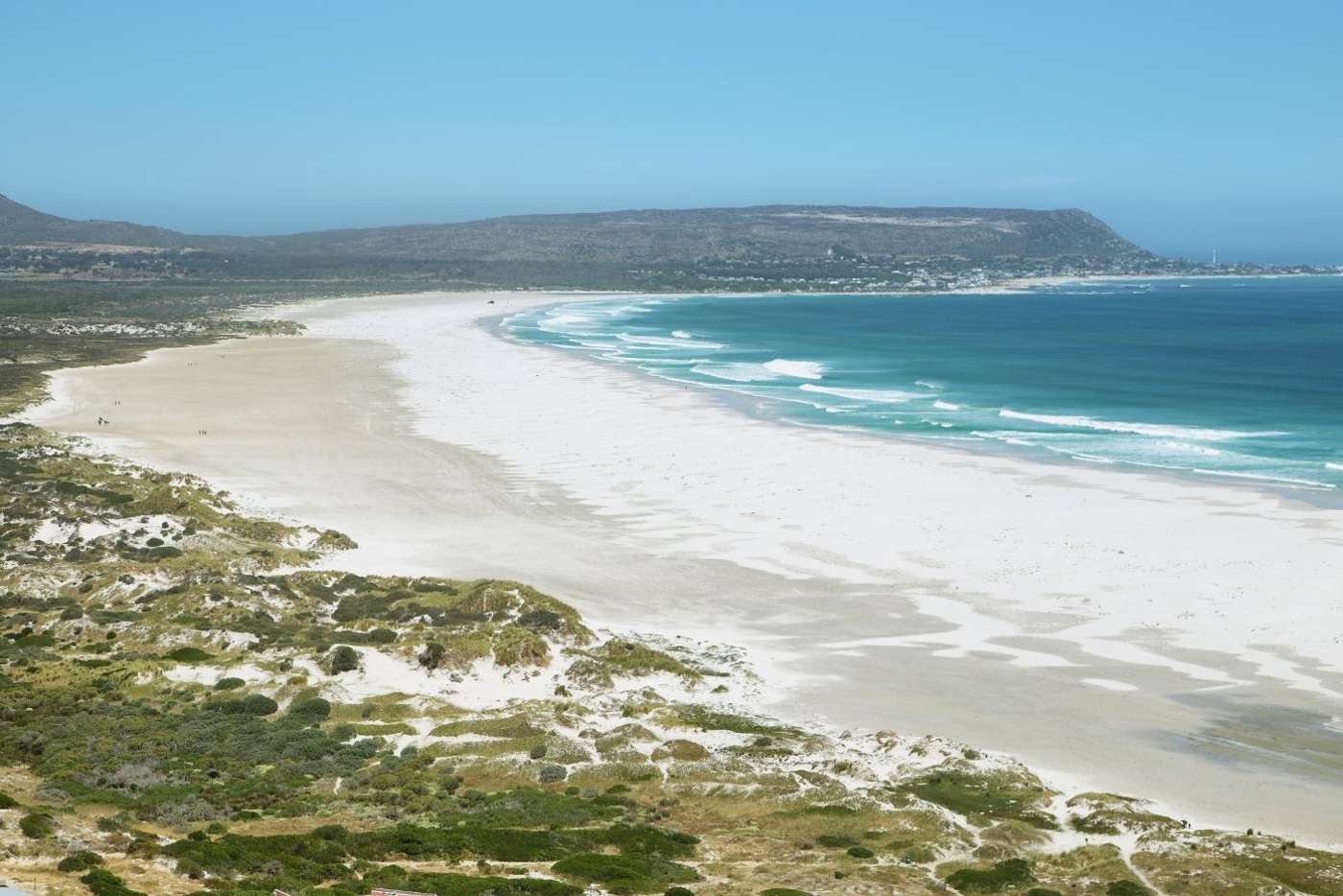 The long white sweep of Noordhoek Beach from the drive