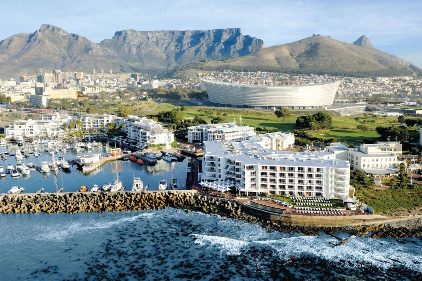 Aerial view of the hotel, the marina, the stadium and Table Mountain